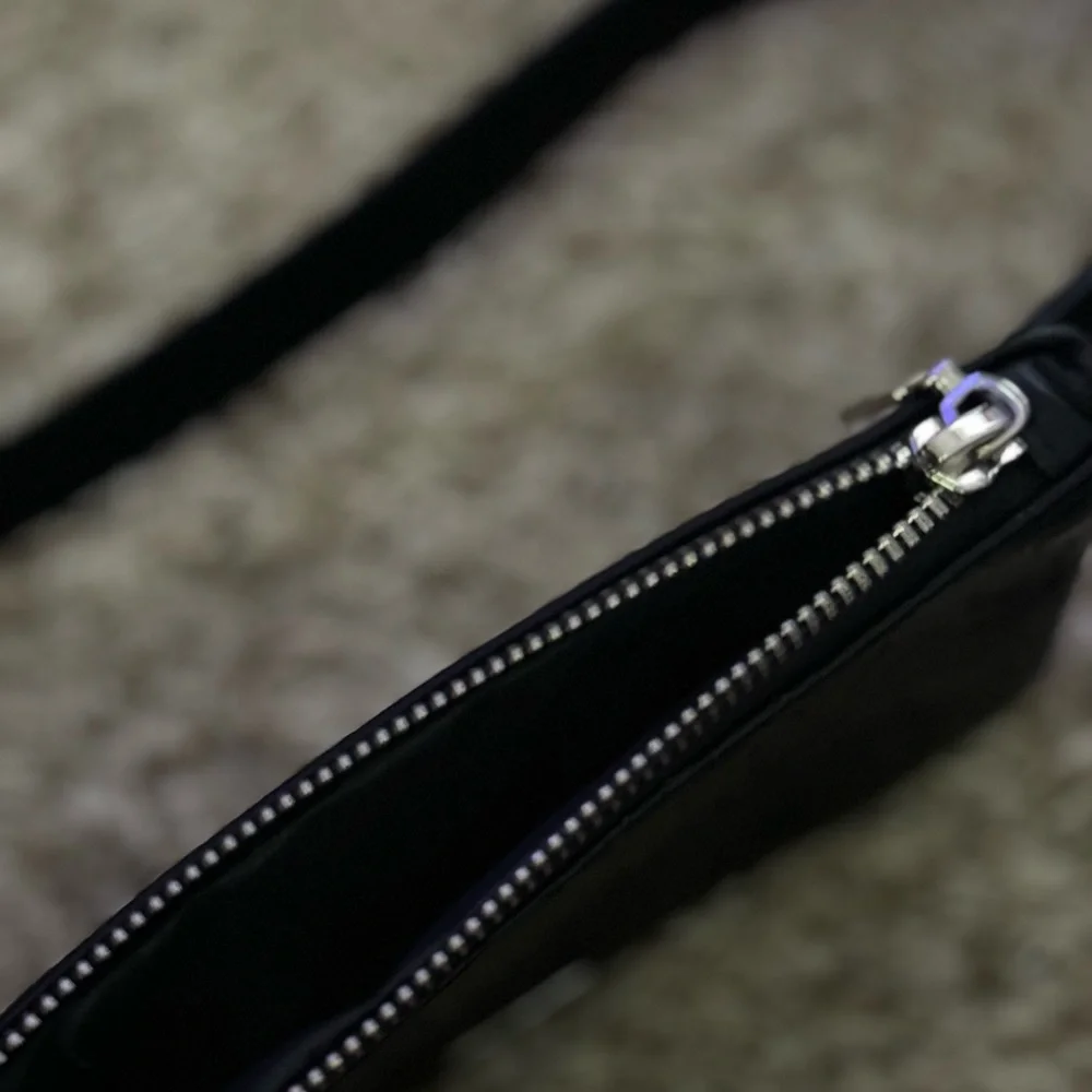 Calvin Klein Embossed Black Waist Bag - Picture 2 of 3